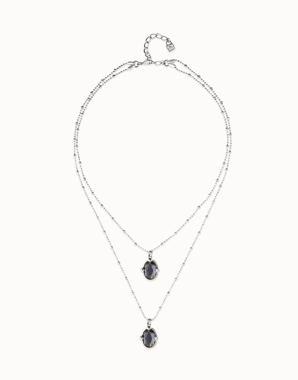Collar COL2030NGRMTL doble bañado en plata con dos cristales facetados ovalados negros