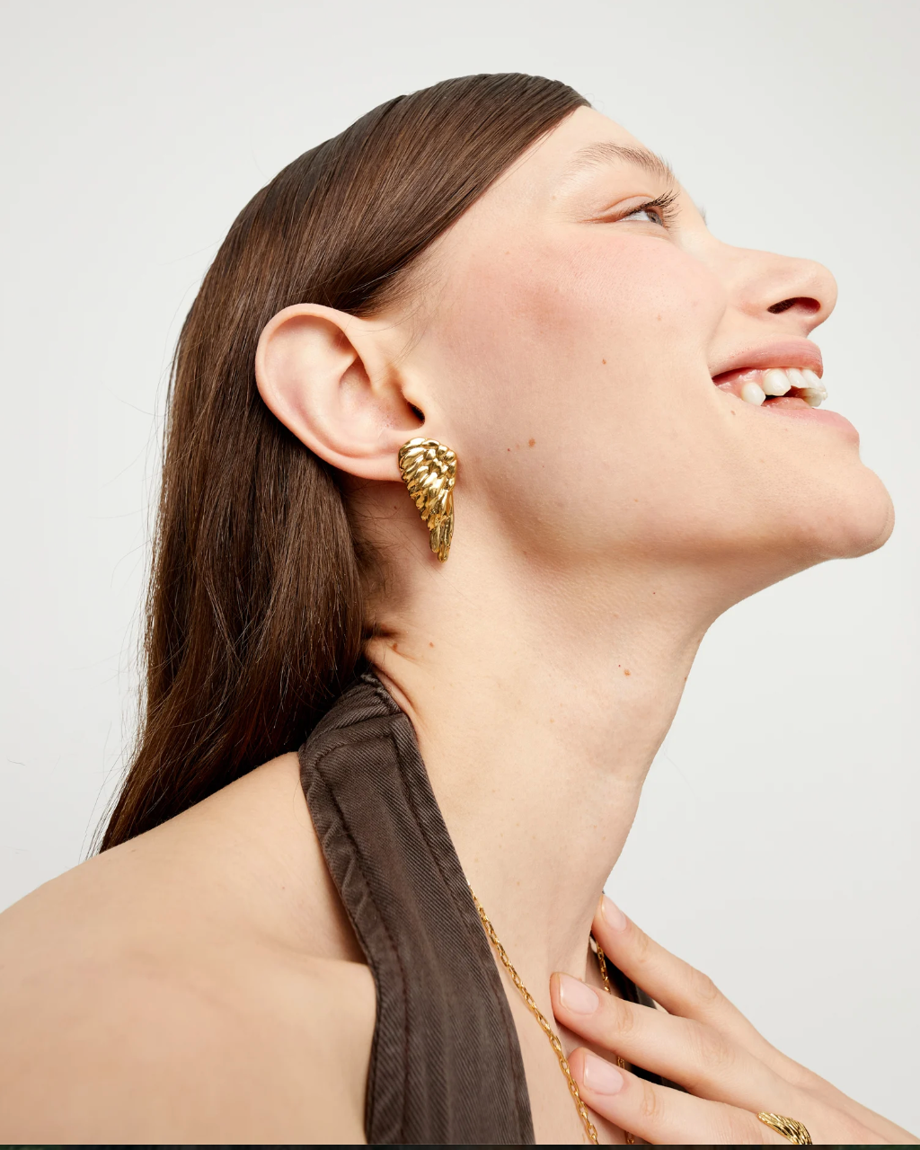 Pendientes bañados en oro 18k con forma de ala