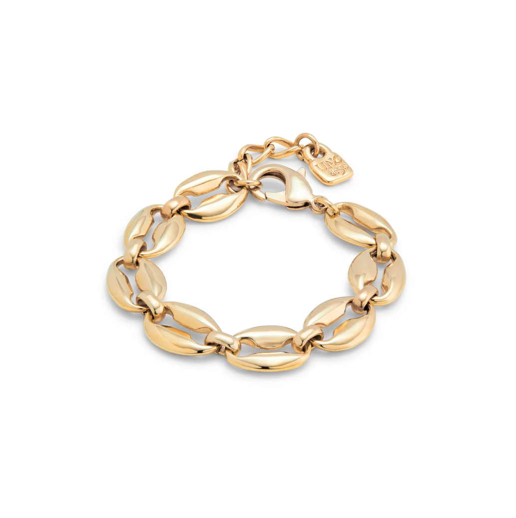 Pulsera con 4 tiras de cuero con cierre botón y charm de corazón bañado en plata de ley