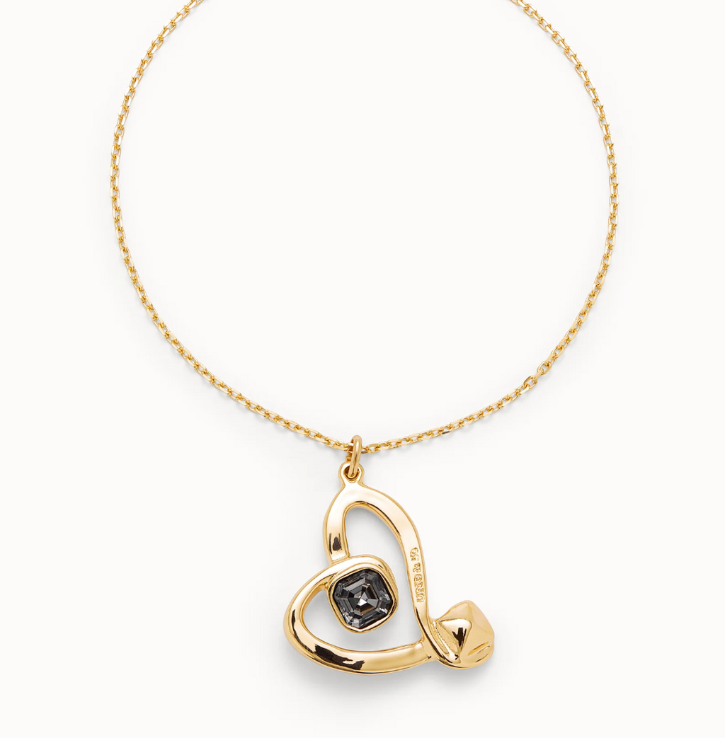 Colgante mediano bañado en oro de 18k y corazón con cristal negro