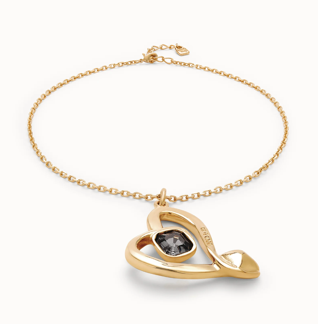 Colgante mediano bañado en oro de 18k y corazón con cristal negro