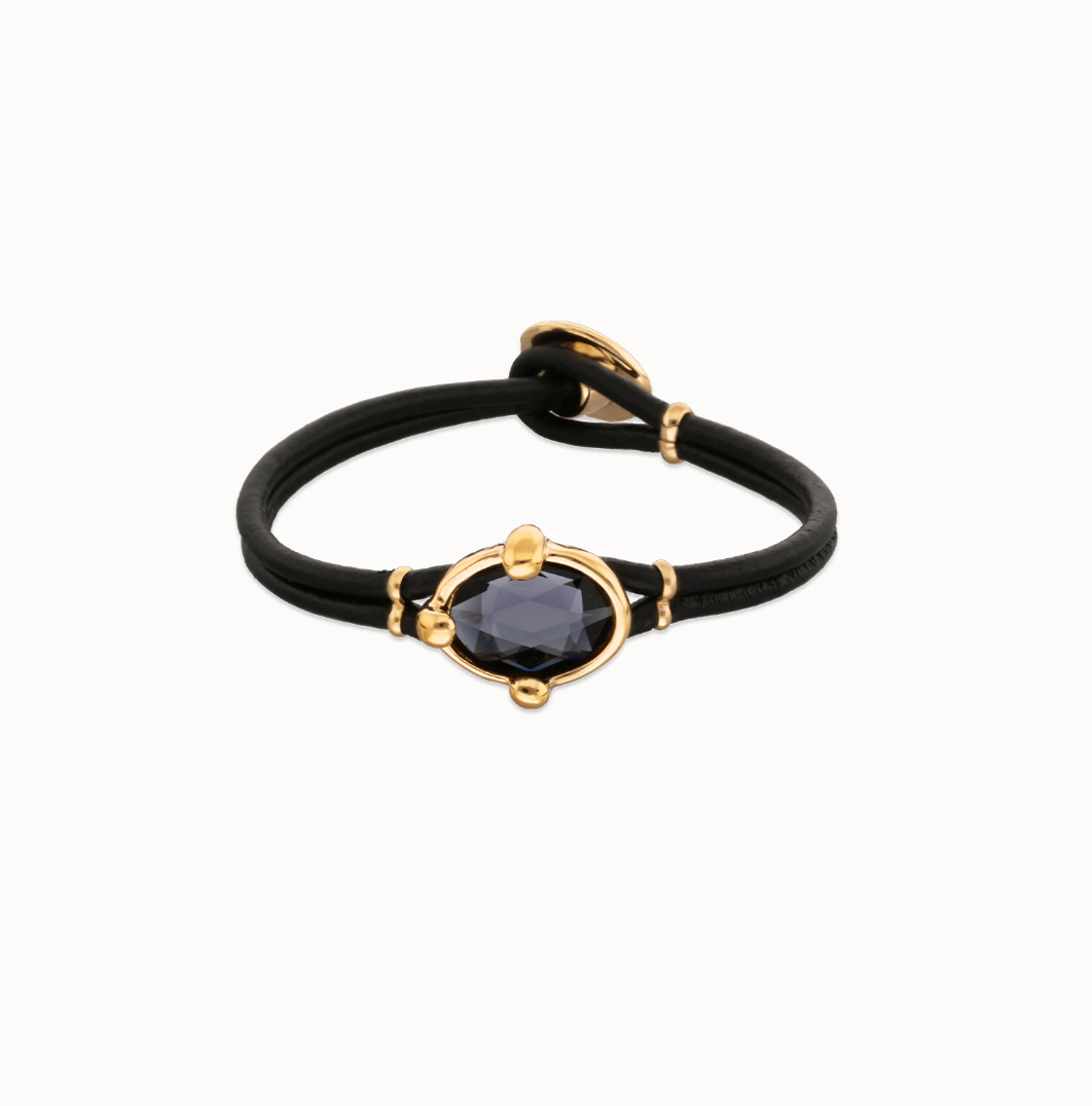 Pulsera de cuero y baño en 18k con cristal facetado ovalado negro