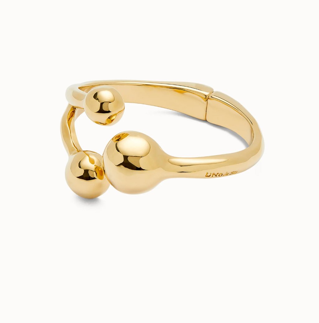 Pulsera rígida con tres bolas bañadas en oro 18k
