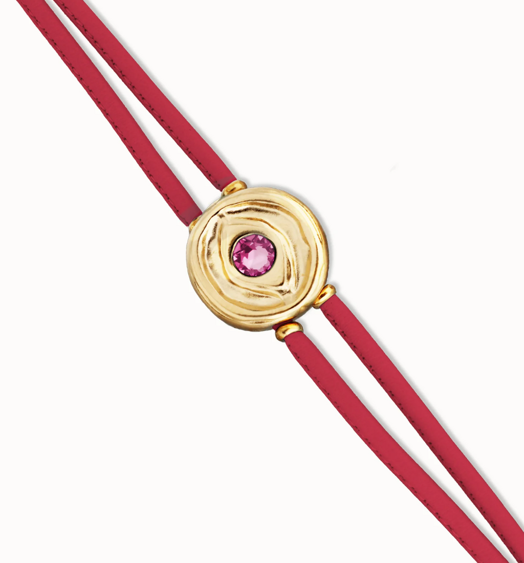 Pulsera doble de cuero fucsia con ojo bañado en oro 18k