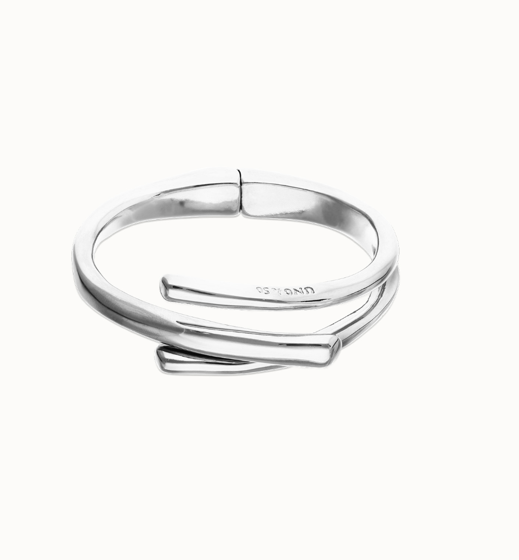 Pulsera rígida bañada en plata de ley con tres formas orgánicas entrelazadas