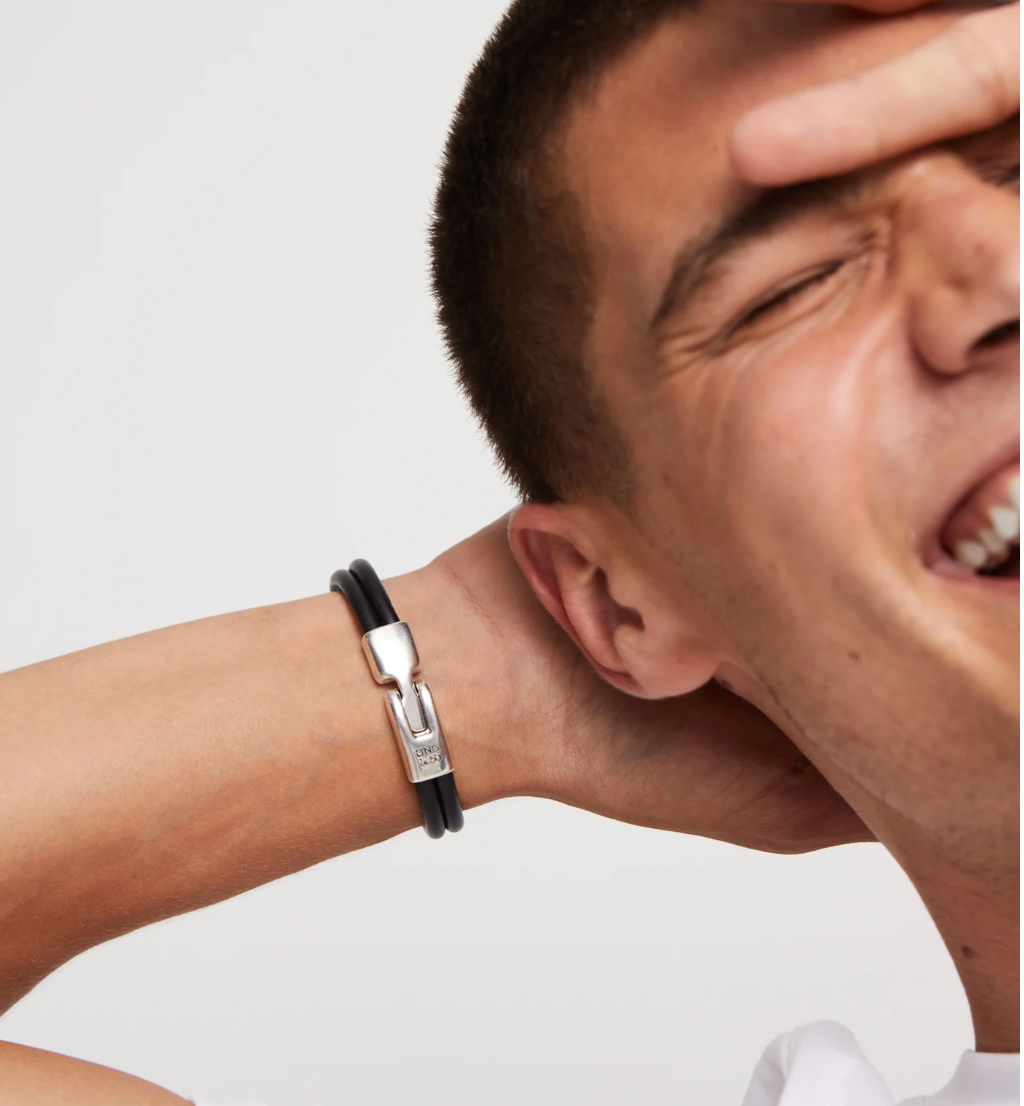 Pulsera doble cuero con 2 circunferencias bañadas en plata de ley