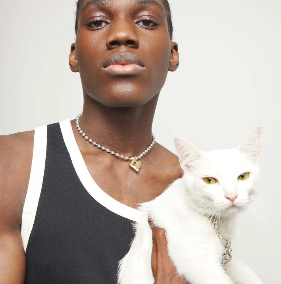 Collar de bolas bañada en plata con detalle de corazón en oro 18k