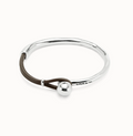 Pulsera semirígida bañada en plata de ley con cuero de color marrón