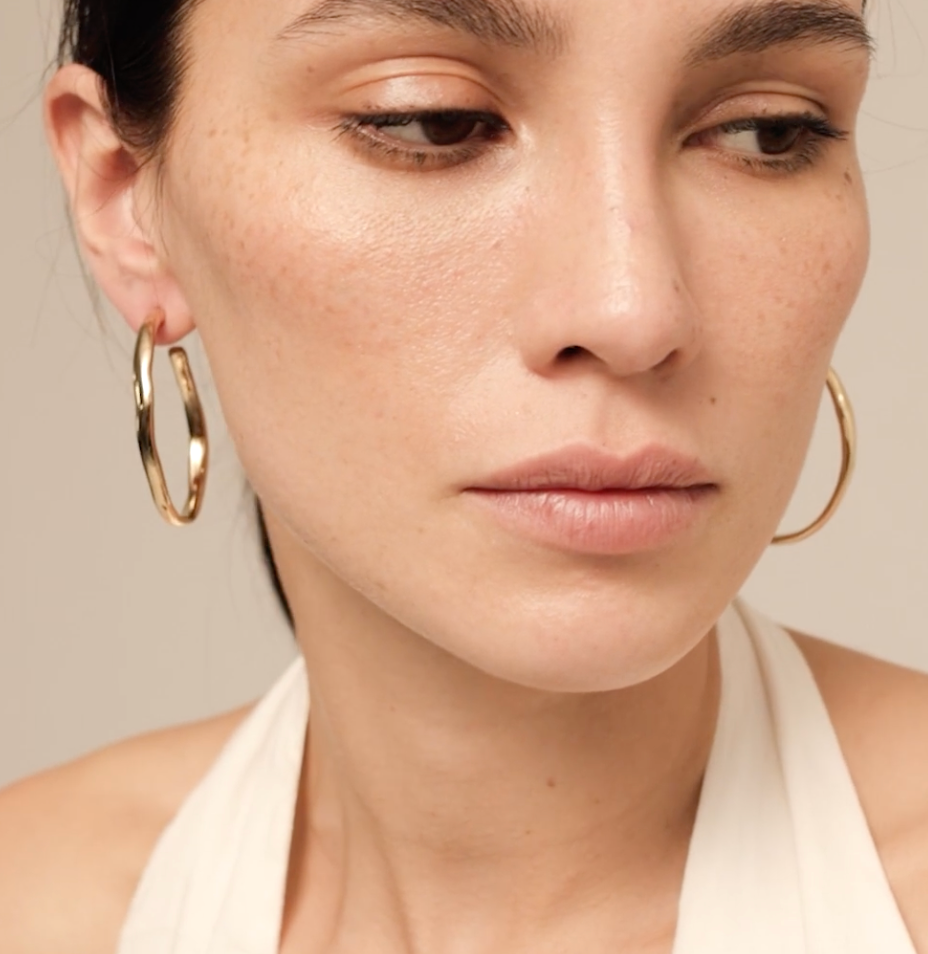 Pendientes de aro abierto bañados en oro de 18k