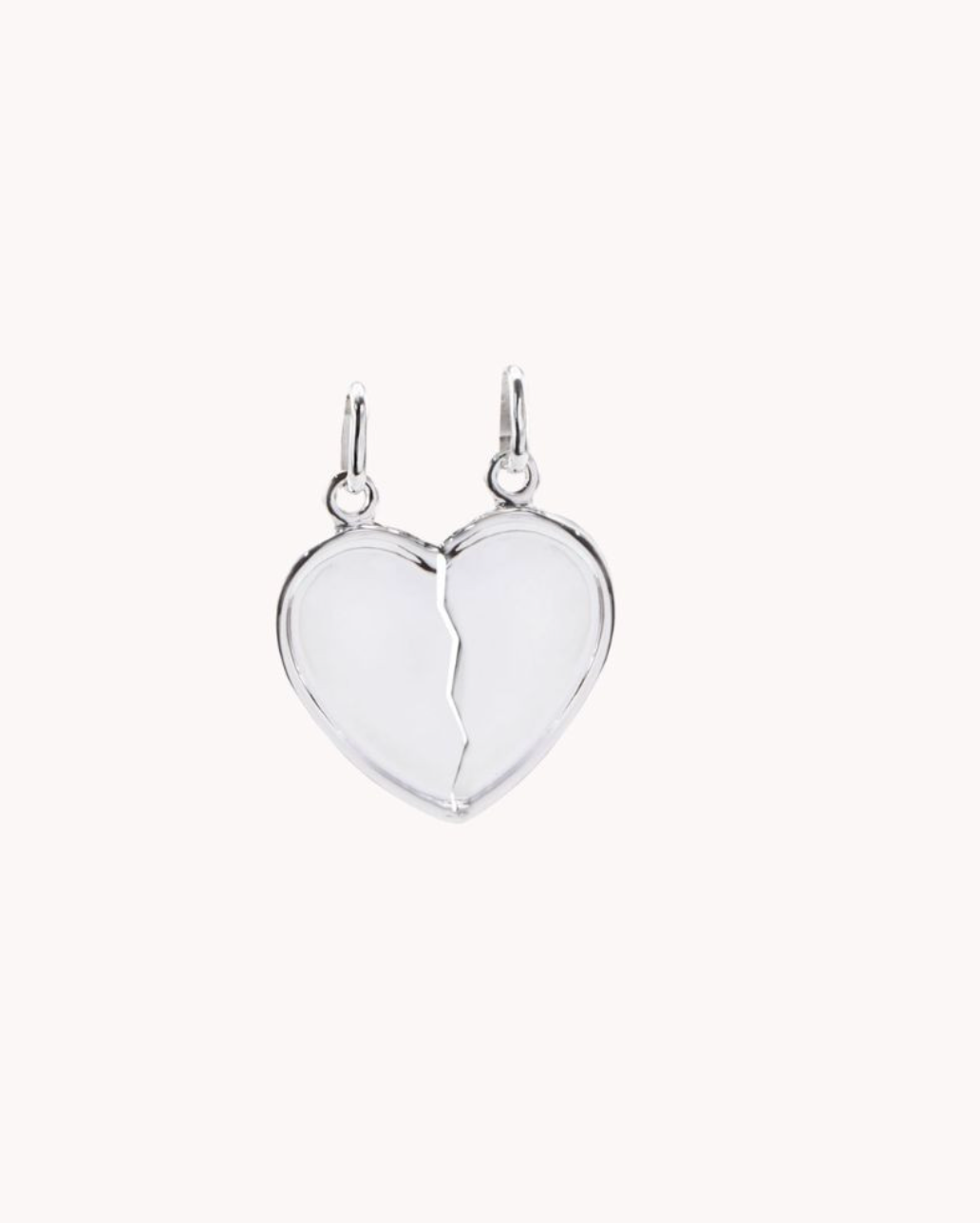 Colgante plata corazon partido liso 1,5 x 1,7cm 52-6072