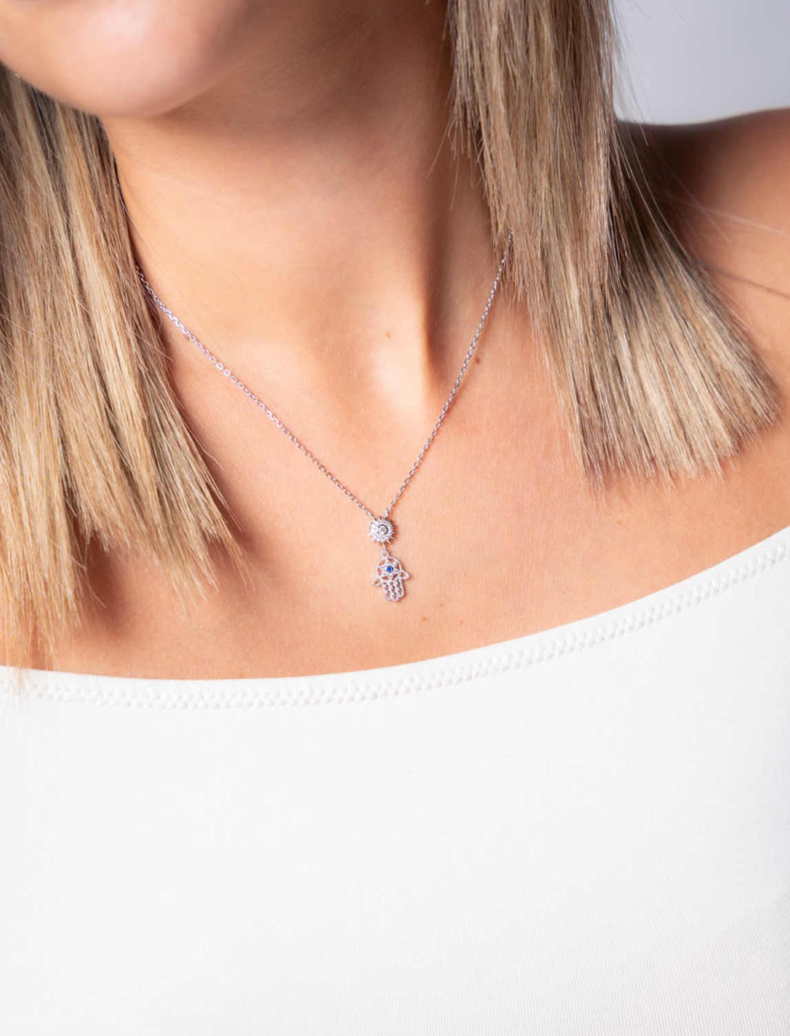 Collar mano de fátima y sol de plata de ley 925 bañada en rodio 42-8053