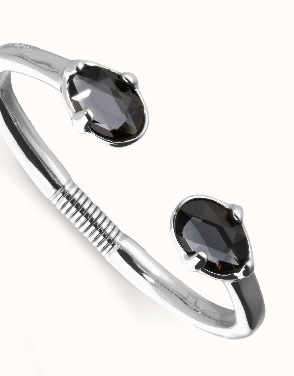 Pulsera PUL2592NGRMTL rígida bañada en plata con dos cristales facetados ovalados negros